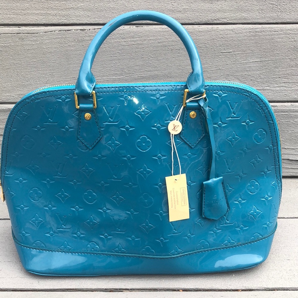 FAUX teal Louis Vuitton bag